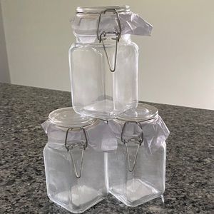 3 small glass latch jars